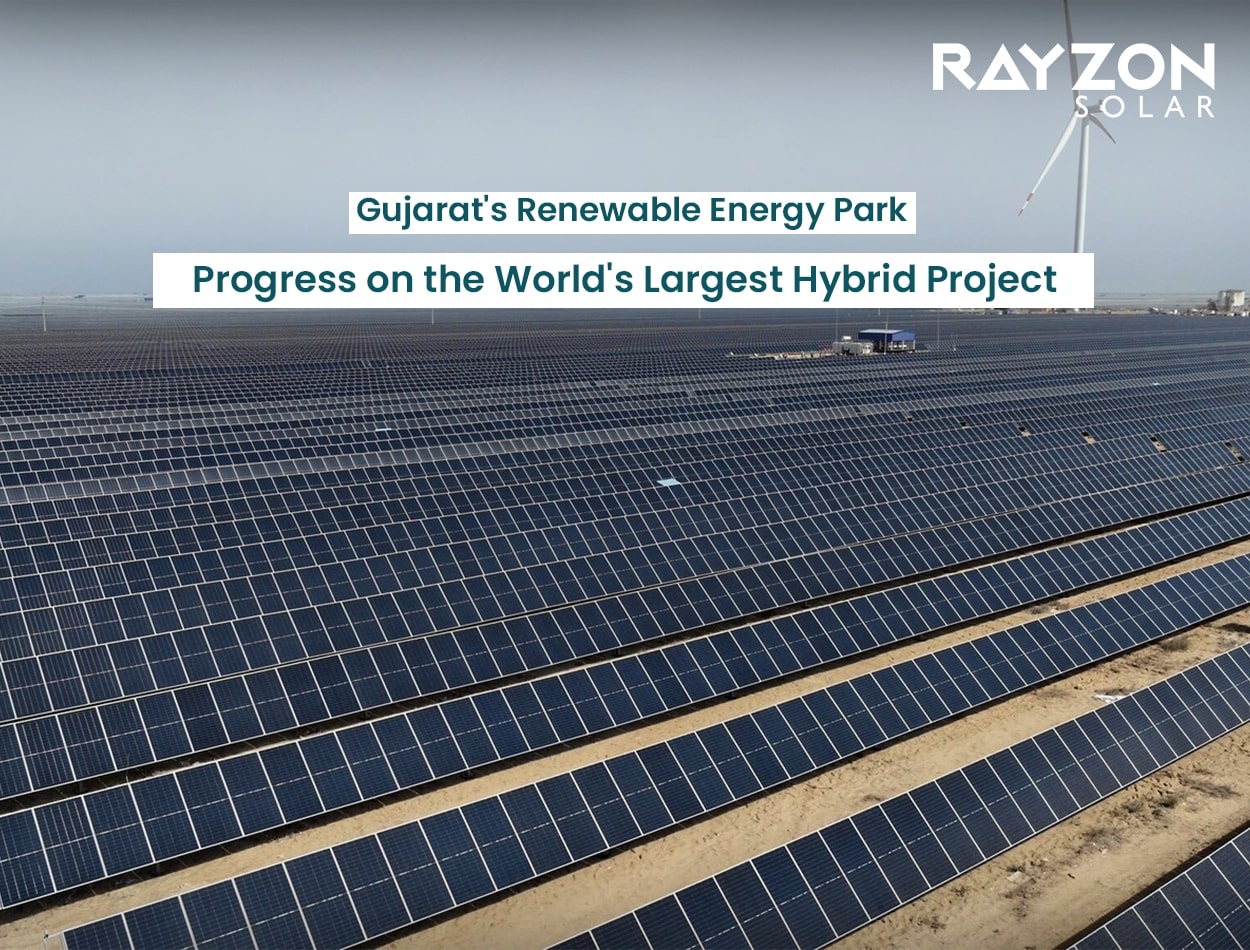 Aerial view of Gujarat's Khavda Renewable Energy Park showcasing solar panels and wind turbines.